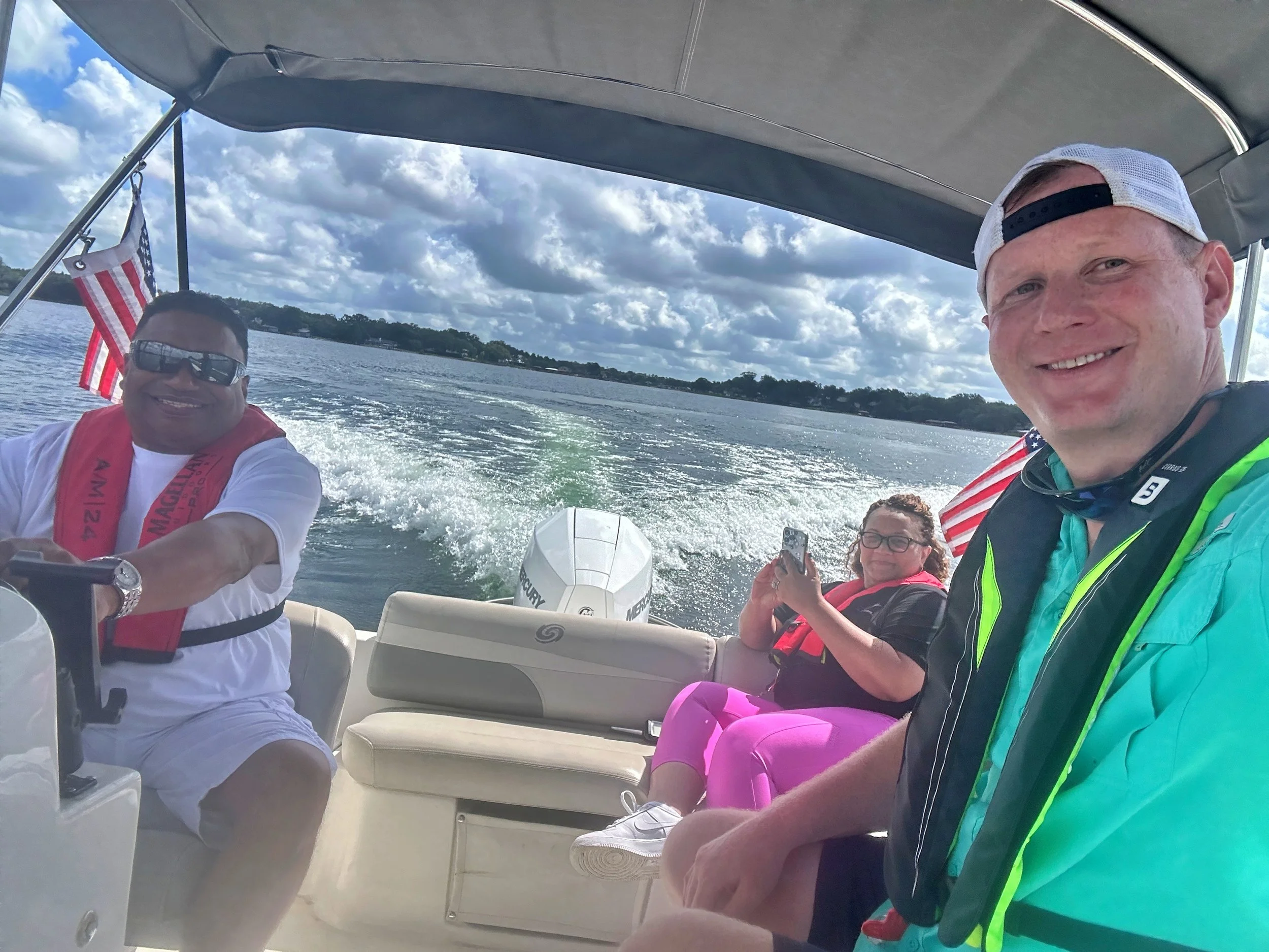 CFBA boaters enjoying time at the helm on a local lake